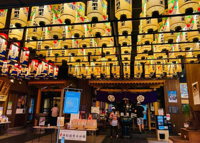 A ceiling of lit paper lanterns at a tourist spot in the Osu Kannon District.